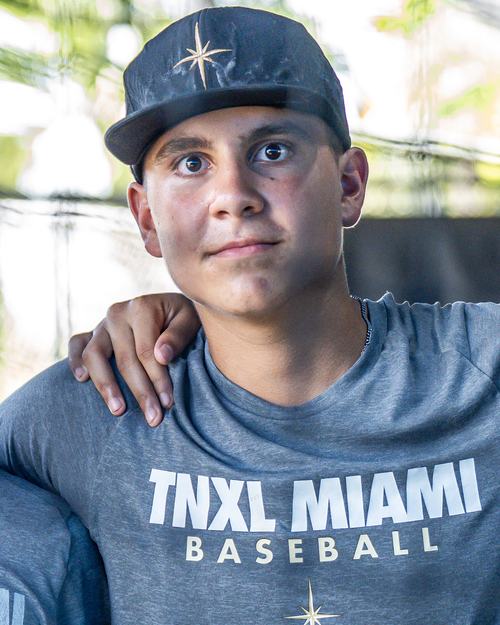 Noah Yanes in a TNXL Miami Baseball shirt